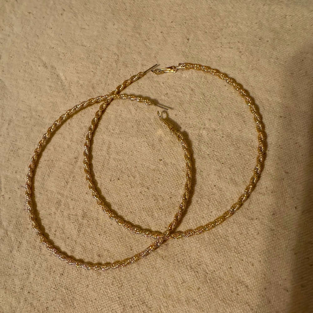 Twisted gold large hoop earrings